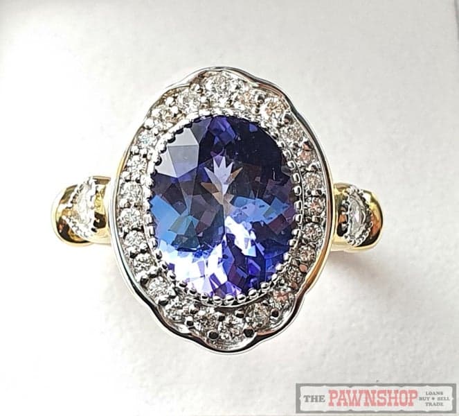 3.513ct Tanzanite and Diamond Cluster Ring in 18ct Yellow Gold $12,000