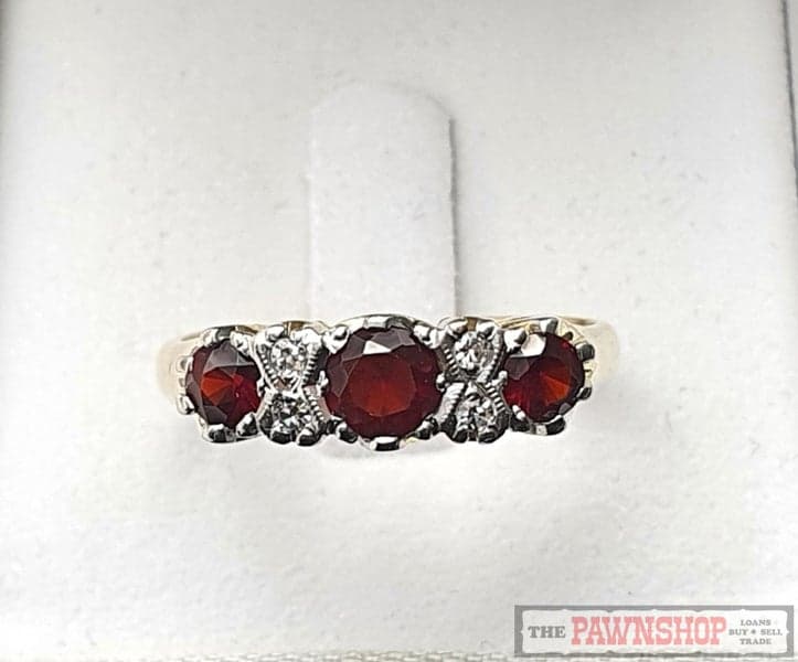 Garnet and Diamond Ring in 18ct Yellow Gold $3,600