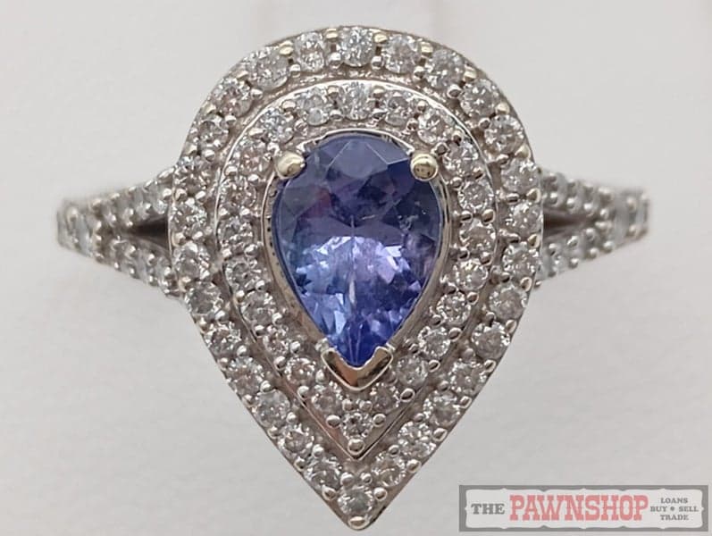 0.60ct Tanzanite and 0.50ct TDW Diamond Cluster Ring in 10ct White Gold $3,200